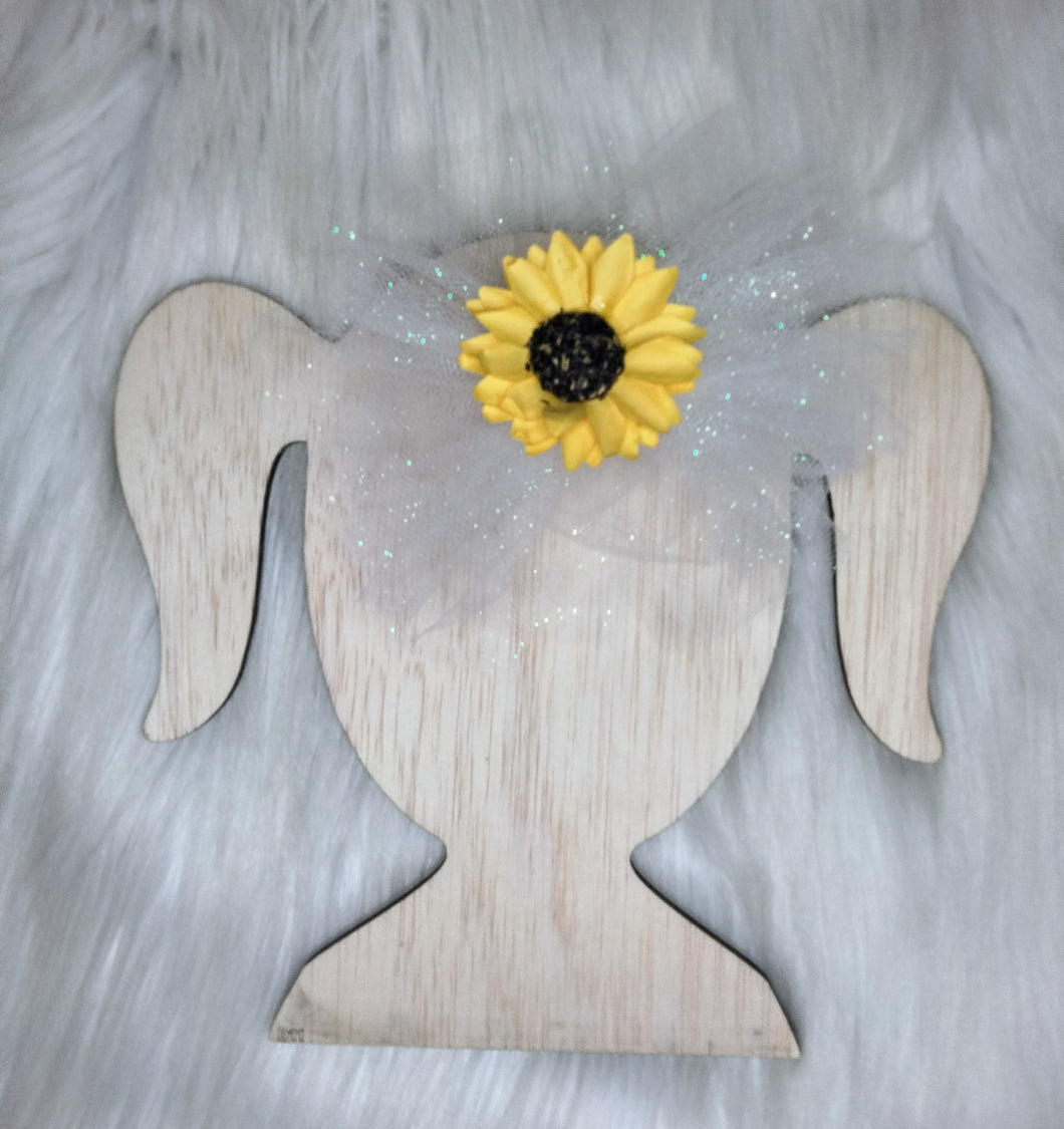 White shredded sunflower bow