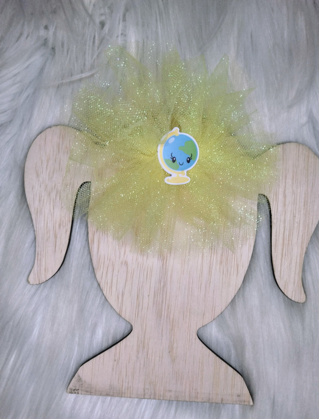 Shredded yellow tulle bow