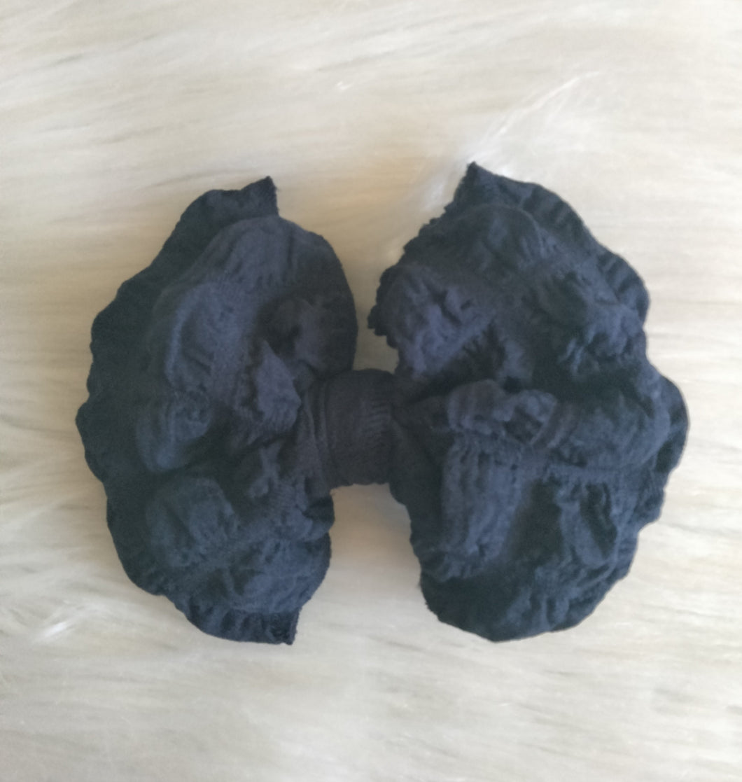 Navy blue popcorn bow