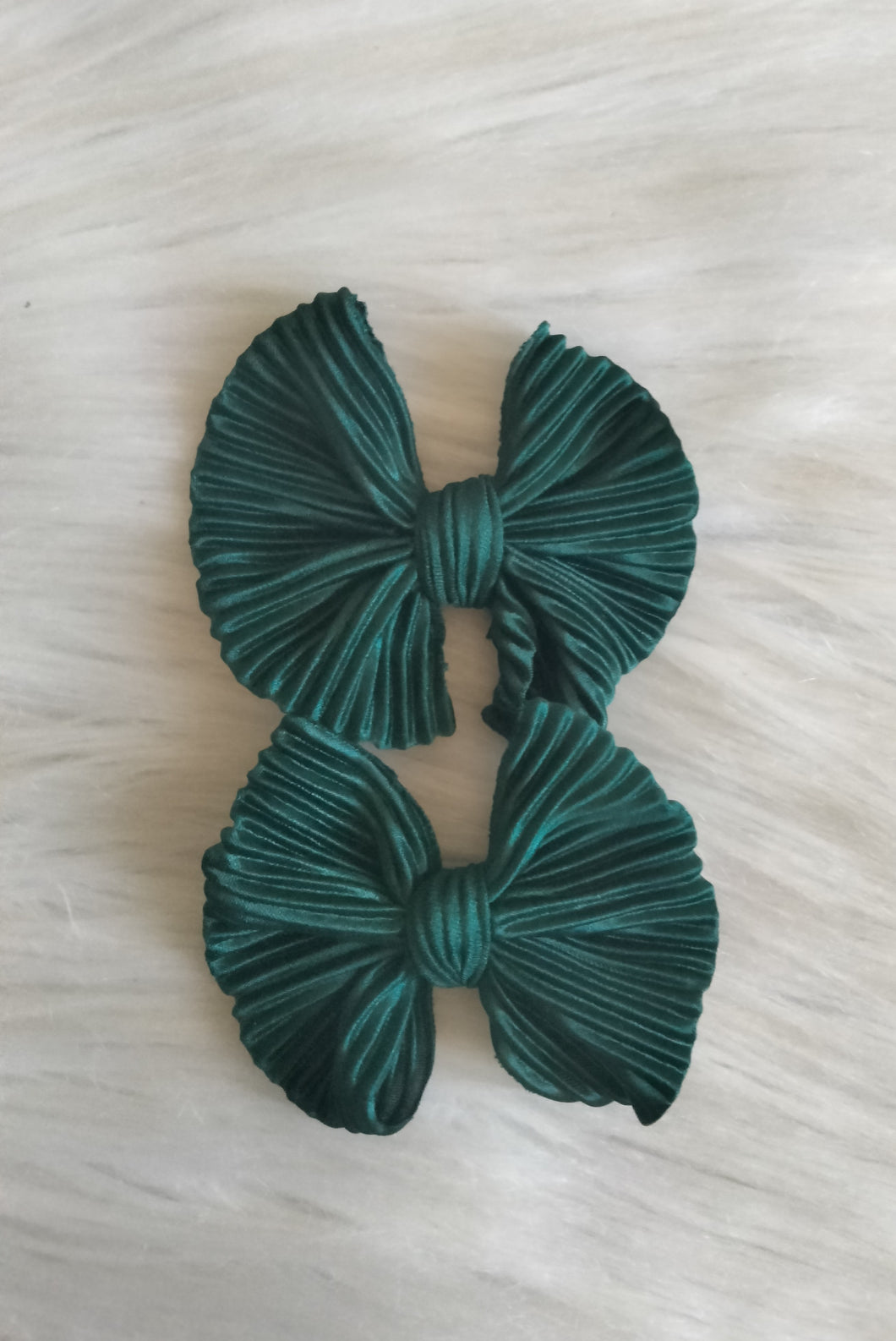 Green pleated piggies