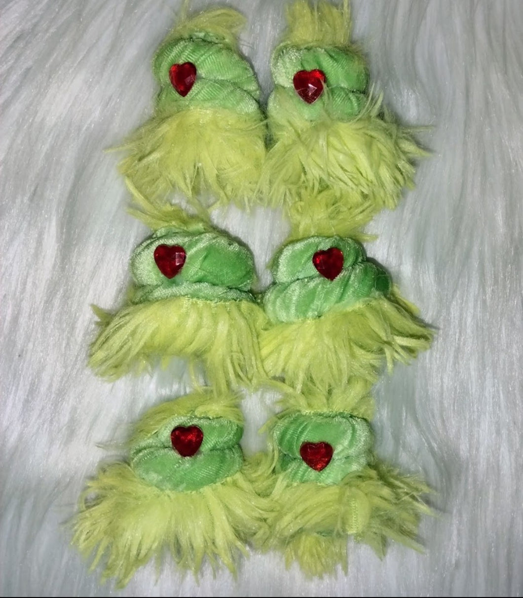 Furry green top knots